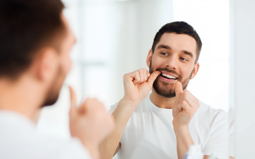 El uso de la seda dental